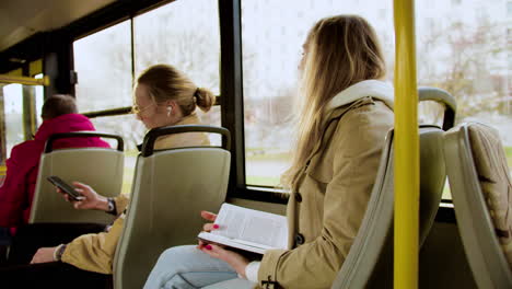 Young-people-sitting-in-the-bus