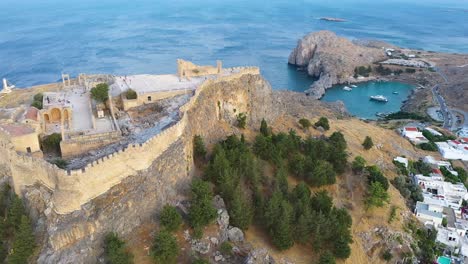 Aerial-drone-shot-above-ruins-of-Acropolis-of-Lindos,-Rhodes,-Dodecanese-Islands,-Greek-Islands,-Greece