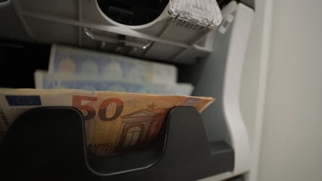 money counting machine counting euro banknotes