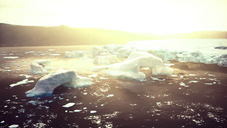 stunning sunrise over floating icebergs in a remote arctic location