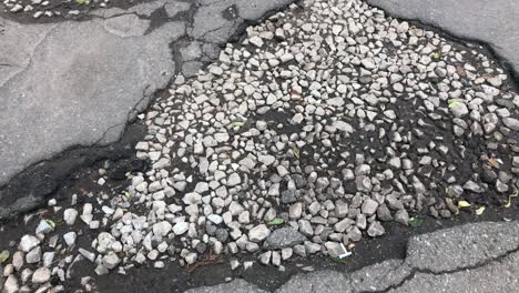 damaged asphalt road