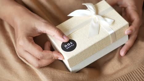 woman receiving a thank you gift