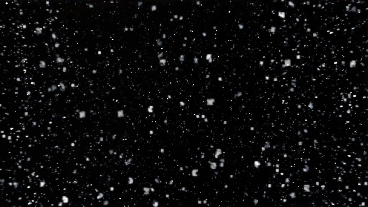 Several snow particles falling down over a black background. Snow Snowfall Snowflake Particles Seamlessly Loop Black Alpha Green Screen Animation