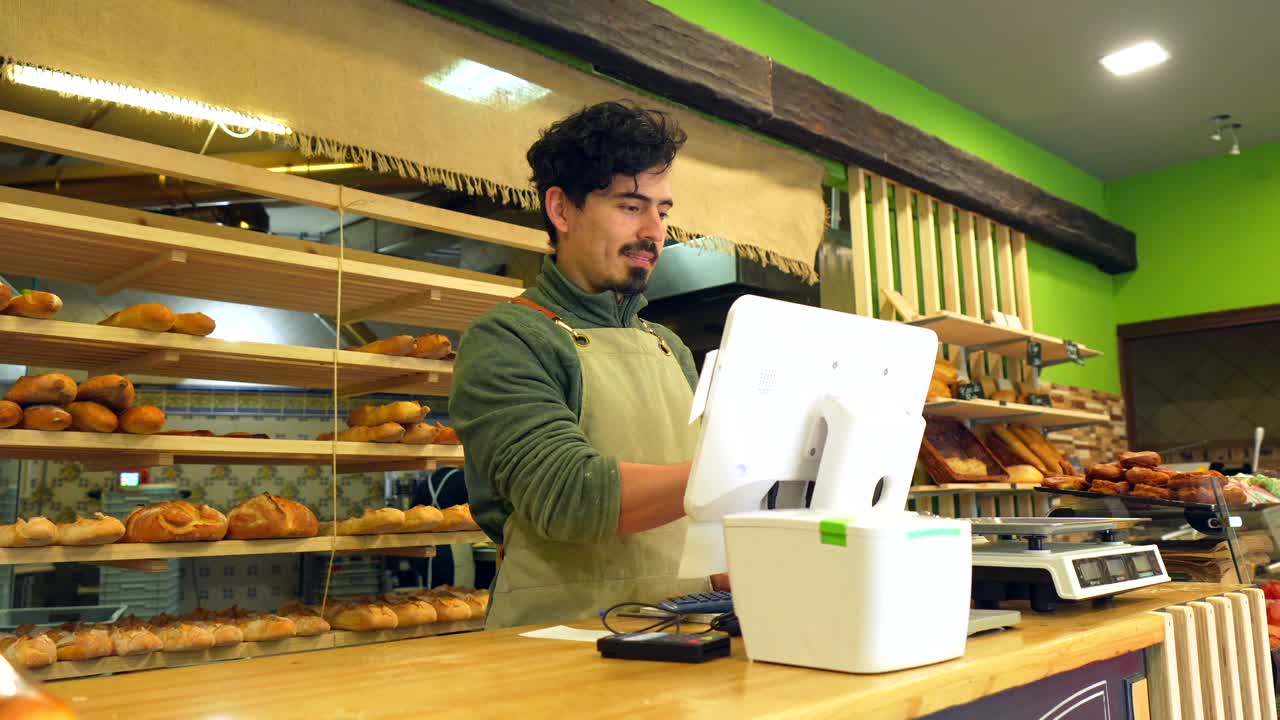 Baker working at the counter in a bakery