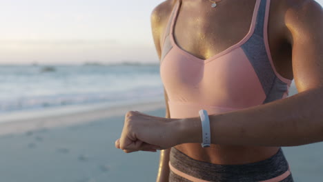 Beach,-running-and-woman-smartwatch-for-fitness