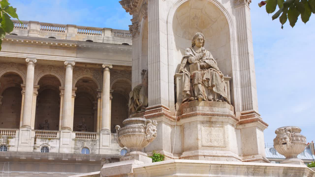 Shot of 17th century Roman Statue in front of Saint-Sulpice church in Paris, France on a sunny day. 4k.