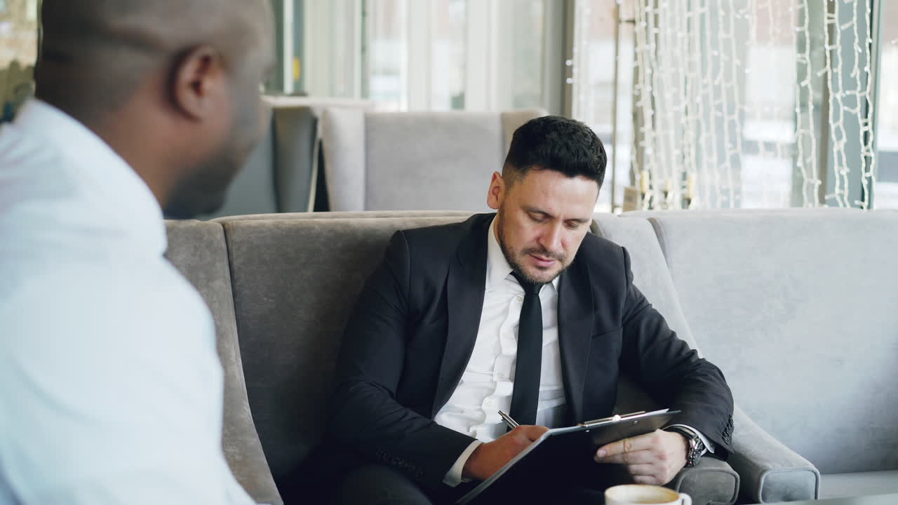 Business Meeting in a Coffee Shop