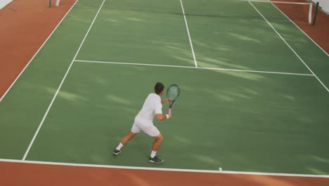 tennis players playing a point