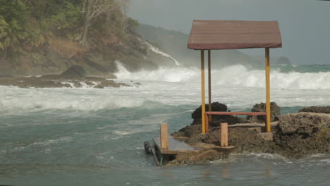 wild waves entering small bay at the colombian caribbean coast near capurganá - chocó