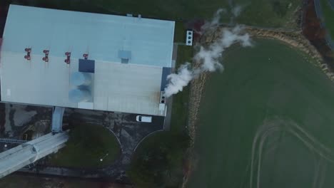 aerial view of coal burning plant producing electricity and heat