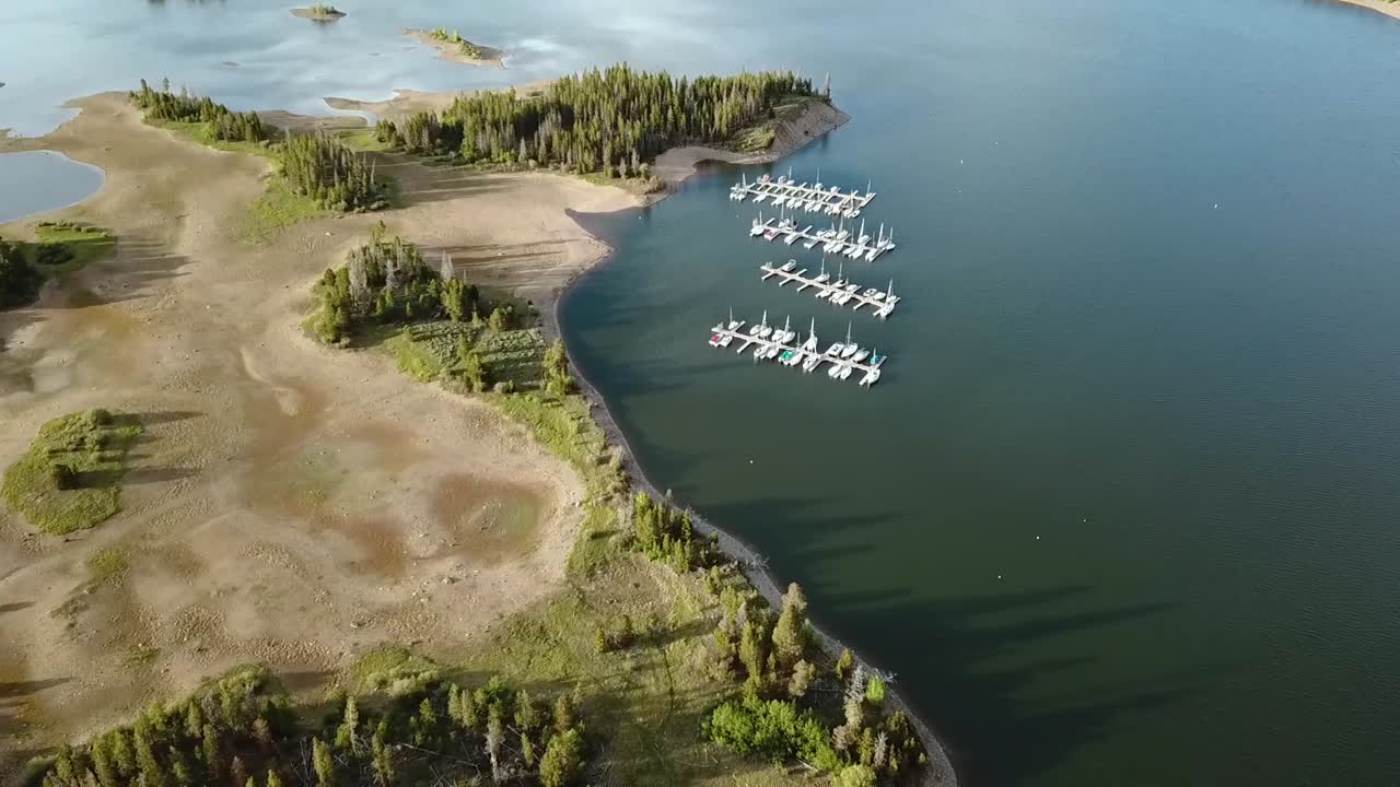 Aerial flight of Lake Dillon nestled within the beautiful Rocky Mountains