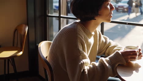 cozy cafe scene with people enjoying the view