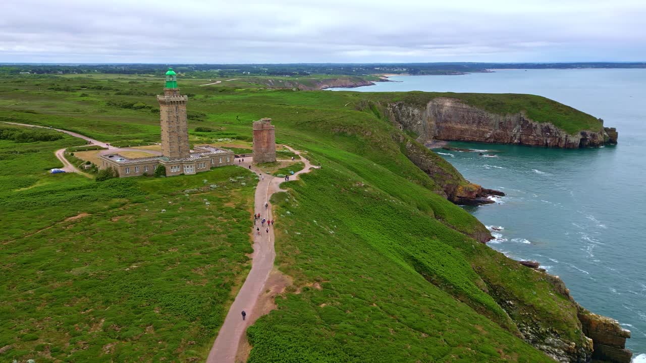 Cap Fréhel peninsula lighthouse and complex overlooking sea cliffs and rocky coastline, Côtes-d'Armor, Brittany, France.