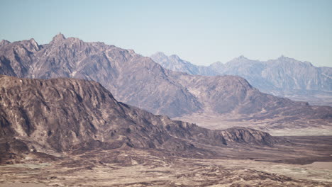 aerial view of a rugged mountain range in a desert