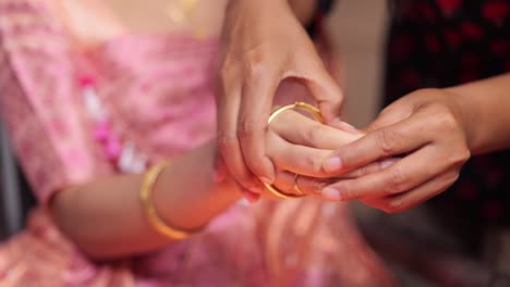 bridal wearing wedding gold ornaments.