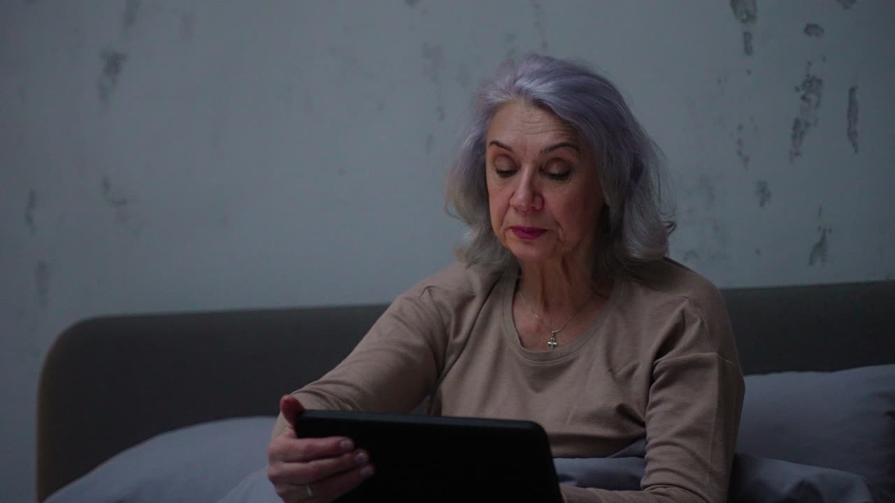 Woman in bed at home