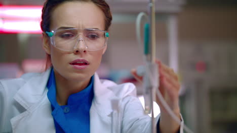 Female-researcher-preparing-for-lab-research.-Closeup-of-laboratory-researcher