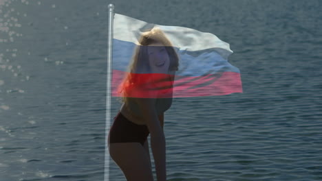standing in water, woman with russian flag animation overlaying scene