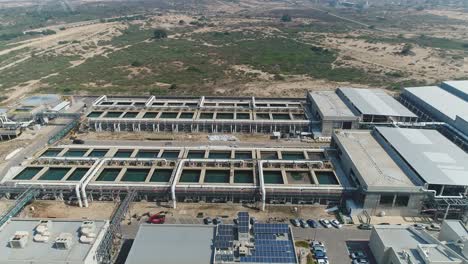 aerial footage of a large scale waste water recycling and treatment facility