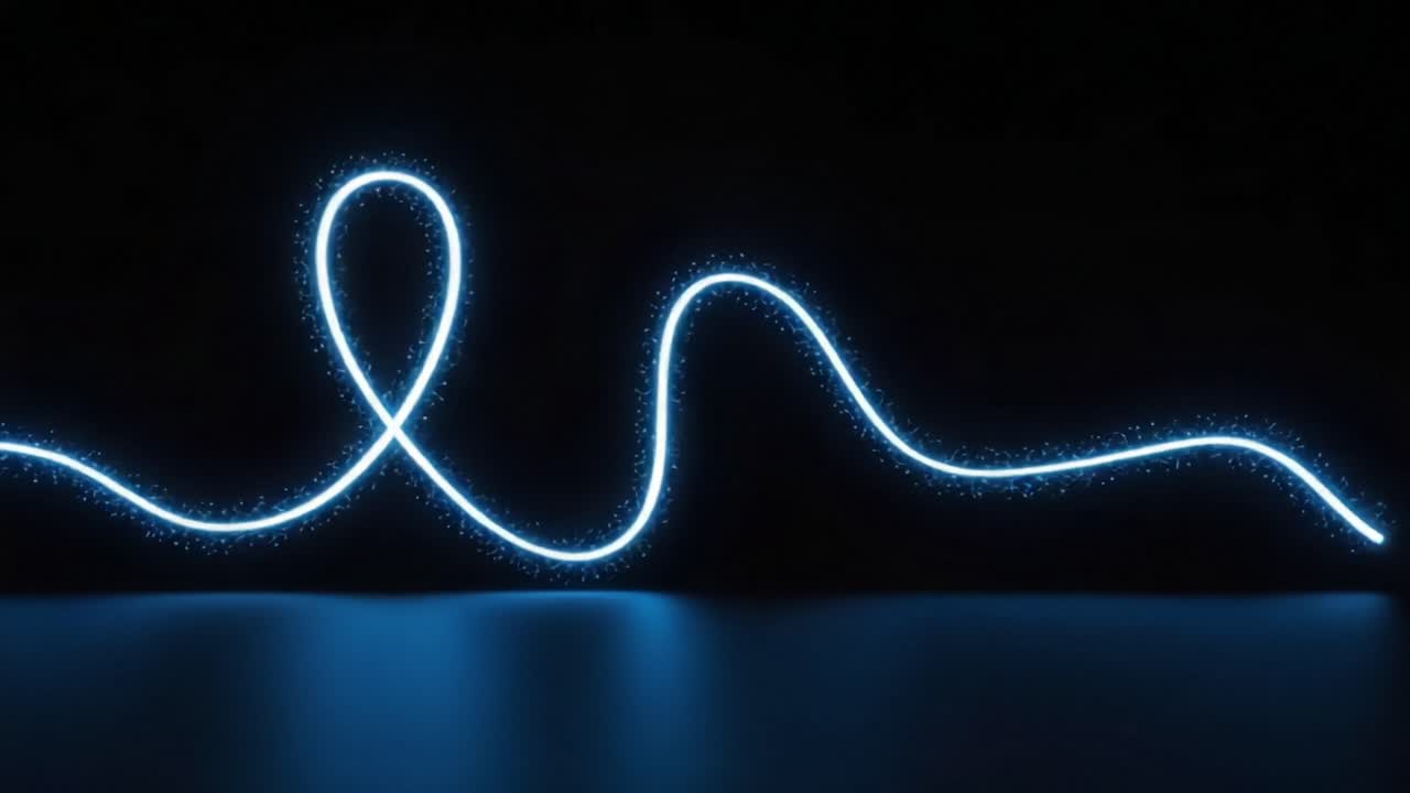 Captivating Illuminated Curves: A Stunning Visual Exploration of Blue Light Trails Creating Elegant and Dynamic Patterns Against a Dark Background