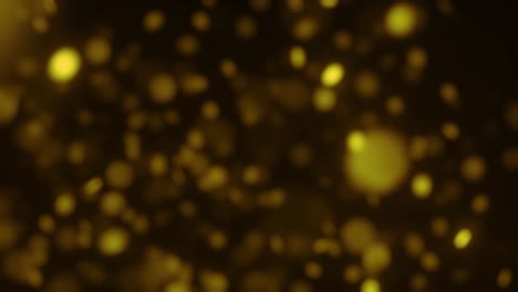 partículas de oro en movimiento de fondo. partícula desde abajo. partícula de oro polvo de fondo parpadeante