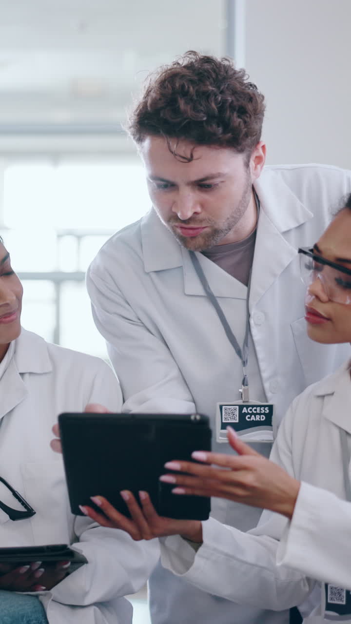 Scientists collaborating in a lab