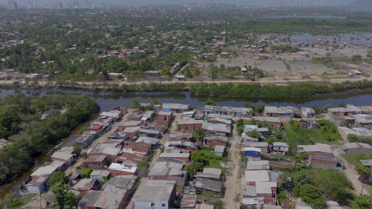 Tracking shot from a drone of a poor neighborhood in Cartagena, Colombia