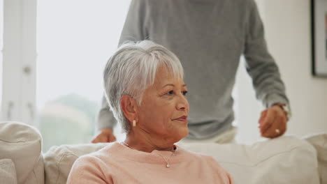 Old-people,-sofa-and-hug-with-love