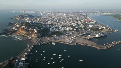 Mazatlan-aerial-mexico-sinaloa-state-cityscape-drone-footage-with-marine-port-harbour-ferry-to-la-paz-Baja-California