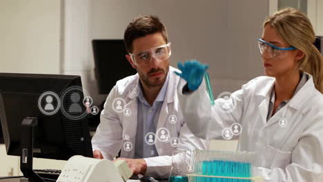 working with computer and test tubes, scientists in lab coats analyzing data animation