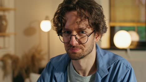 man drinking coffee at home