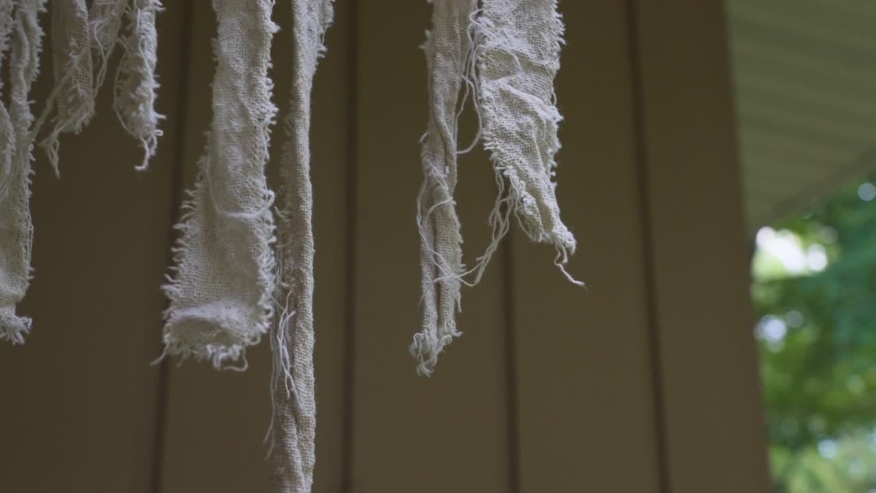 Strips of fabric made to look like mummy wrappings for Halloween