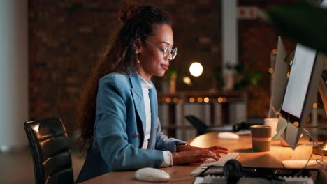 happy, night and business woman on computer typing