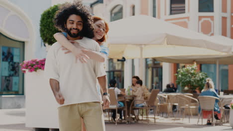 happy couple hugging outdoors