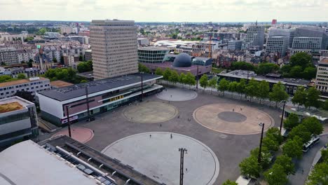 aerial view of a city square with cinema and buildings