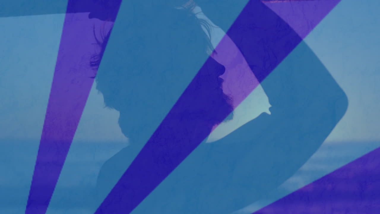Silhouetted man gazing seaside horizon, showcasing technology with floating blue purple polygons