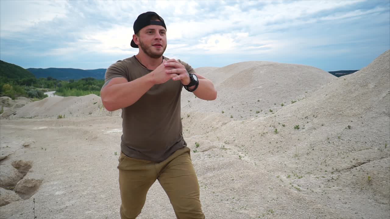 Man Doing Squats in a Quarry