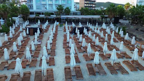 ksamil albania empty luxury sunbed poda beach early morning holiday destination