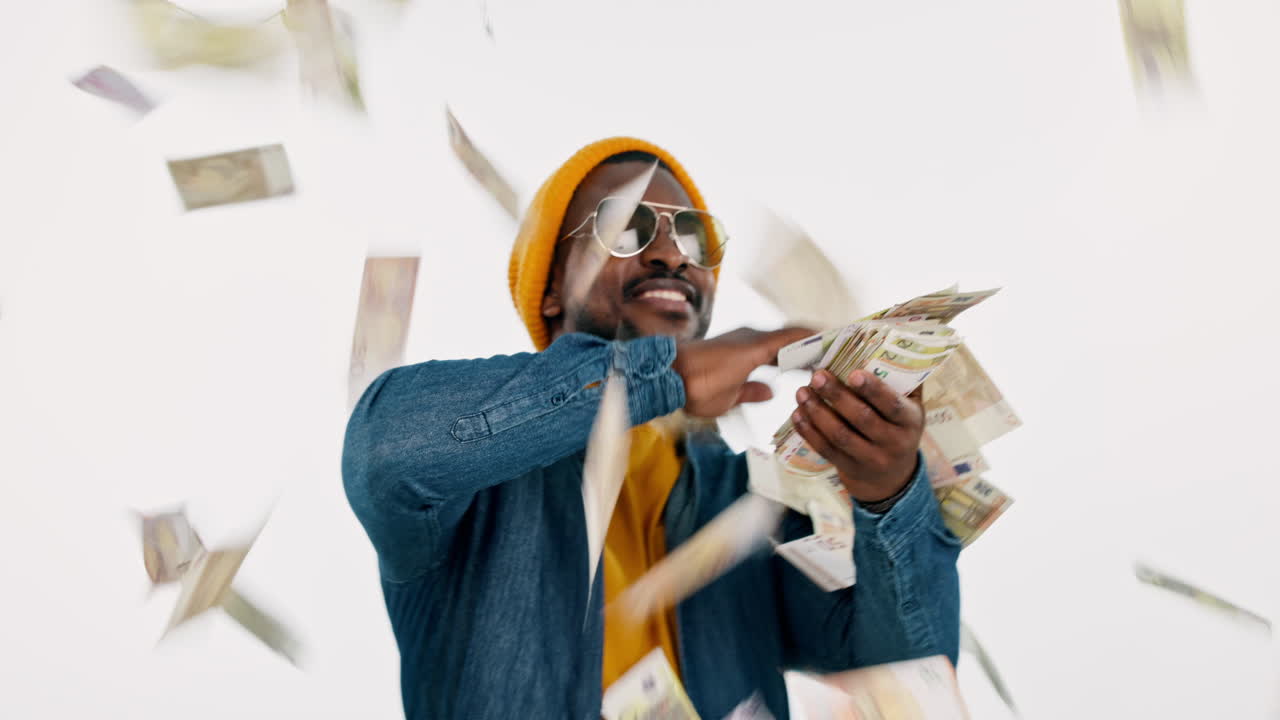 Money rain, rich and man in studio for winning