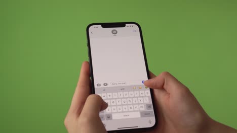 woman canceling an appointment on iMessage in front of green screen