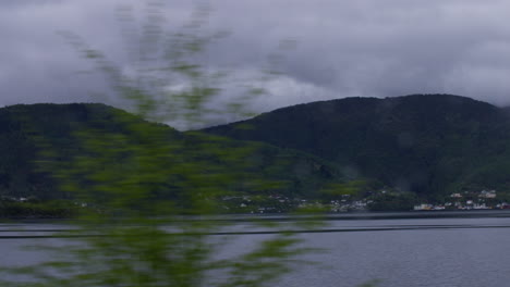 hand-held shot of the vestland fjord landscape on a gloomy day, in norway