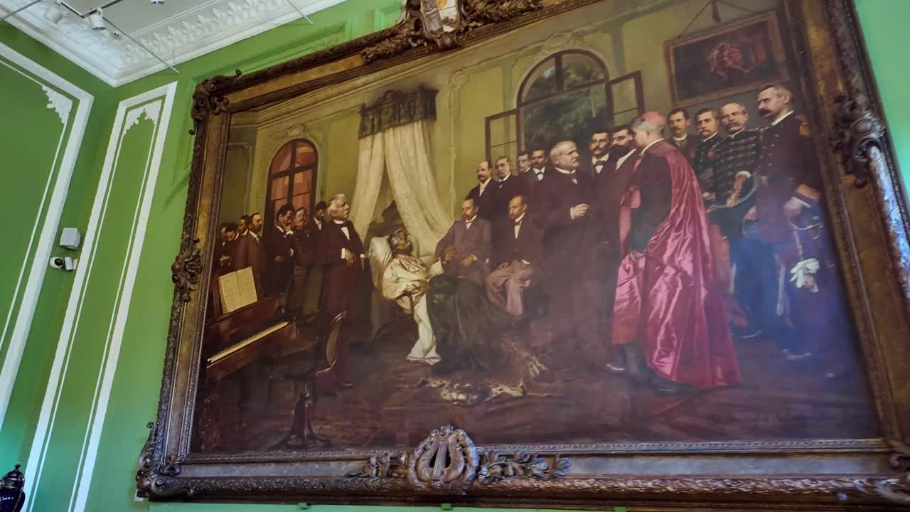 Painting of a historical event with a group of people indoors.