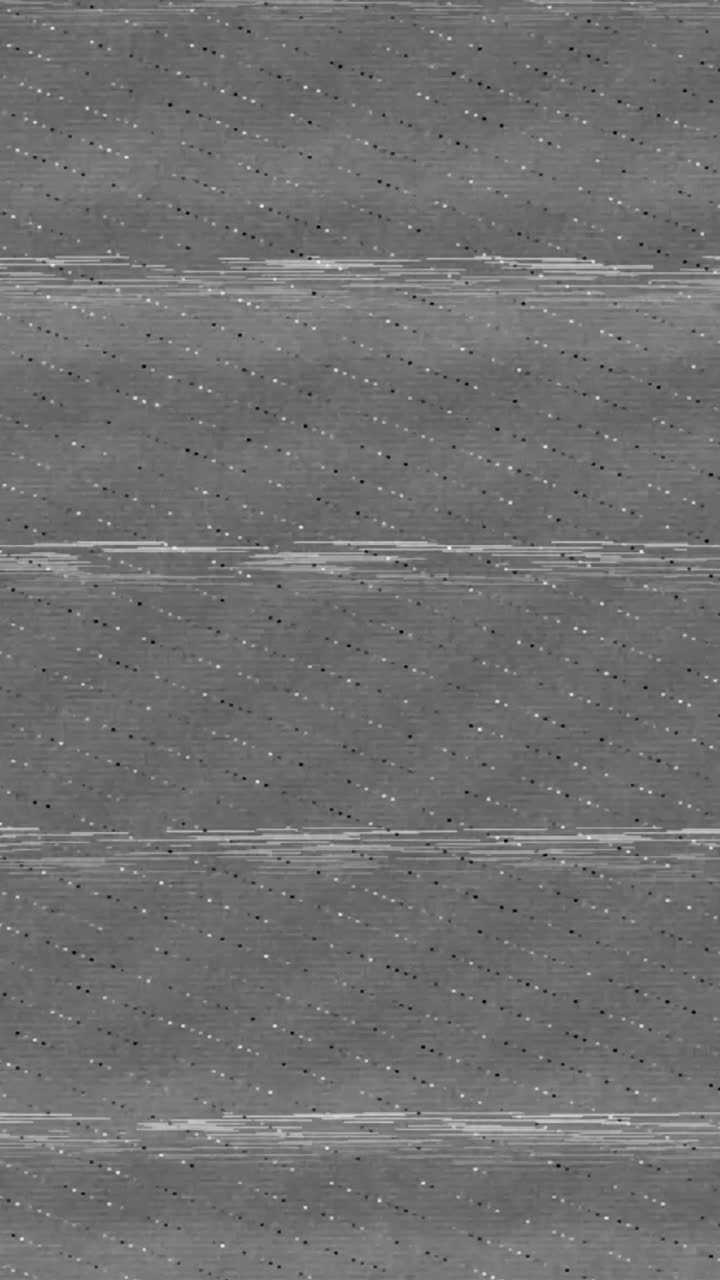 Vertical grey screen with heavy film grain, dust particles, and horizontal scratches, simulating a damaged vintage film texture