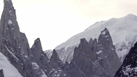 zoom in straight on view of the steep rocky peaks of domo blanco mountain, patagonia, argentina