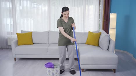 unhappy cleaning woman.