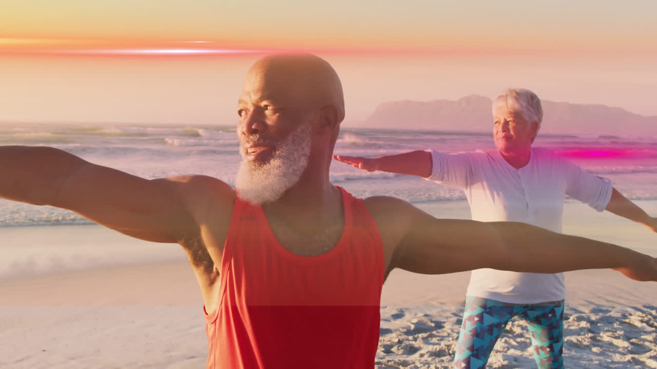 Practicing yoga on beach, elderly couple enjoying vibrant sunset together