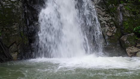 Close-up-of-Bulalacao-Waterfalls-flowing-pools-with-white-water-in-El-Nido-in-Palawan,-Philippines,-Southeast-Asia