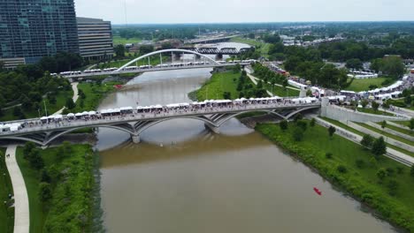 columbus arts festival, columbus ohio, aerial drone footage, over the scioto river on the rich street and town street bridges in downtown columbus, ohio 2022