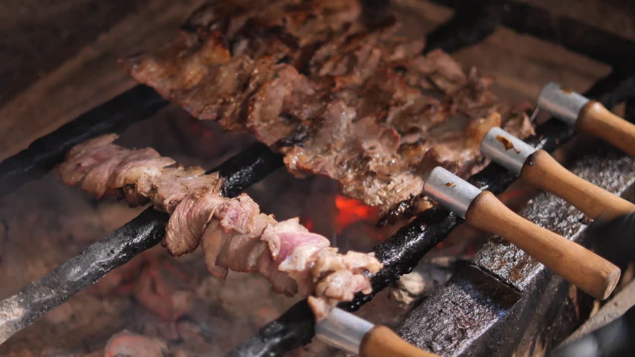 Grilling Meat Kebabs on a Charcoal Grill