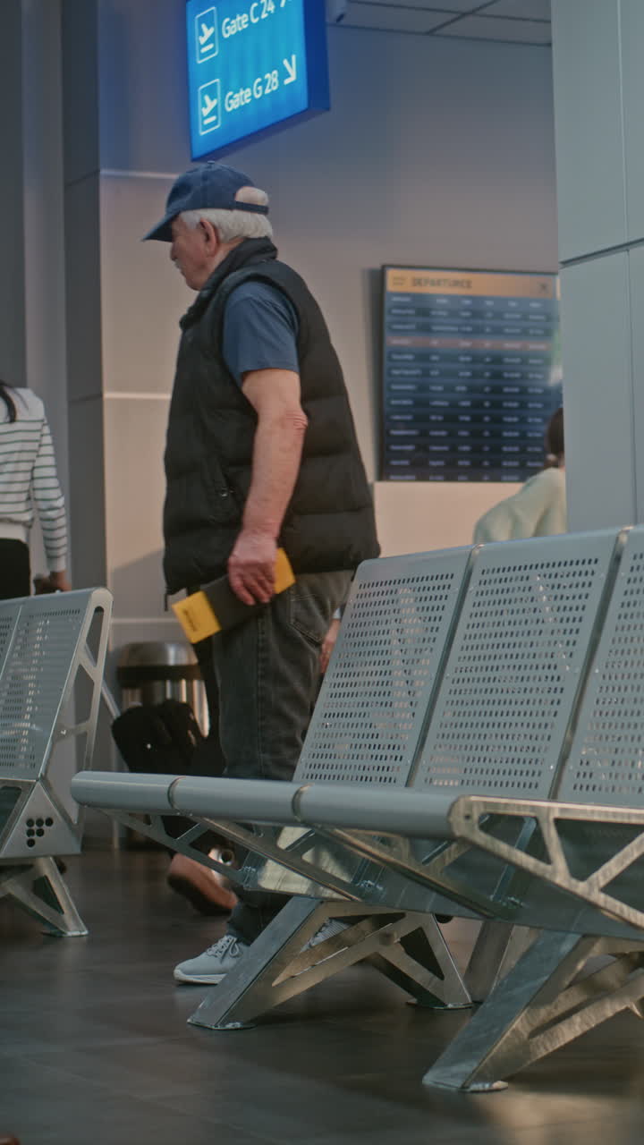 Elderly Man at Airport Waiting for Flight